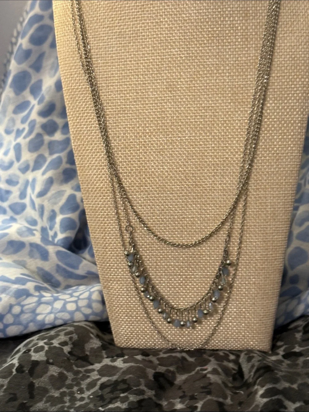 Multi-Strand Silver Tone Necklace with Dark Accent Drops